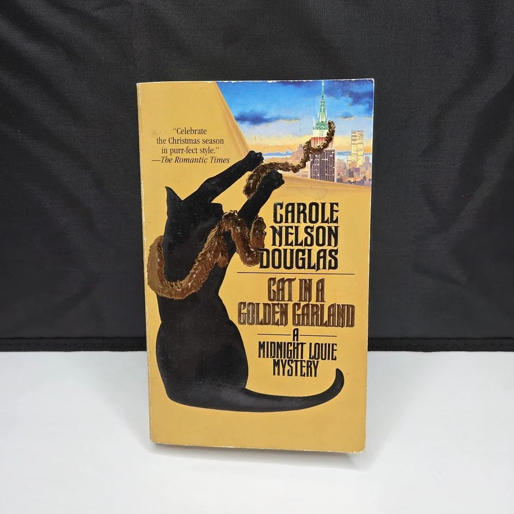 Cat in a Golden Garland by Carole Nelson Douglas Midnight Louie Mystery
